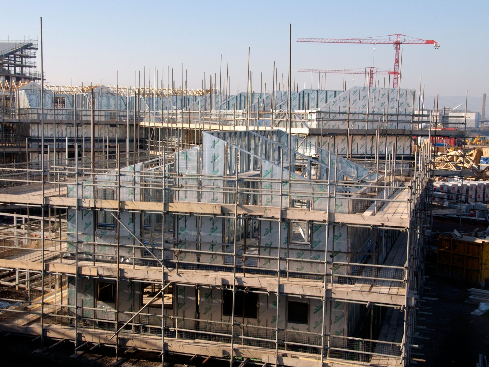 Residential scheme under construction, wrapped in scaffolding